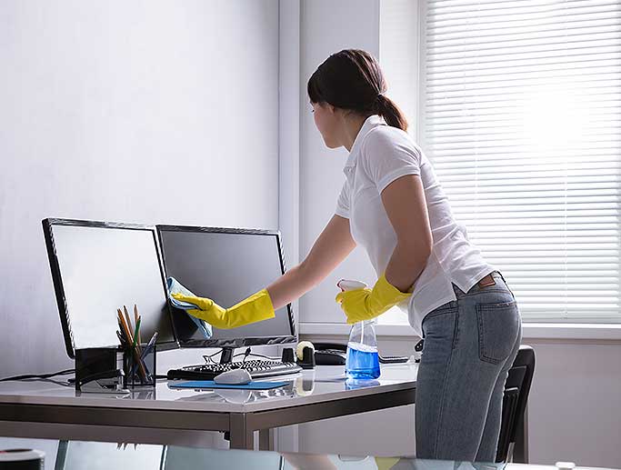 Maid cleaning Nampa office
